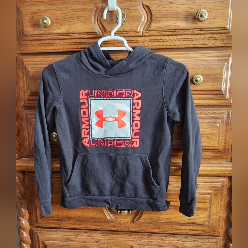 Black youth under Armour hoodie